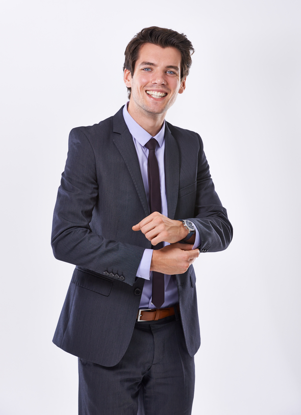 Studio shot of a handsome young businessman against a white background